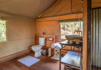 Deteema Springs Camp en-suite bathroom flush toilet hot cold shower Hwange Zimbabwe