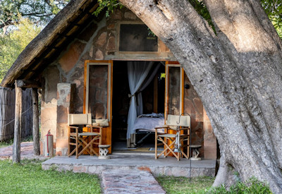 Bumbusi Wilderness Camp library lounge comfortable sleeping area Hwange Zimbabwe