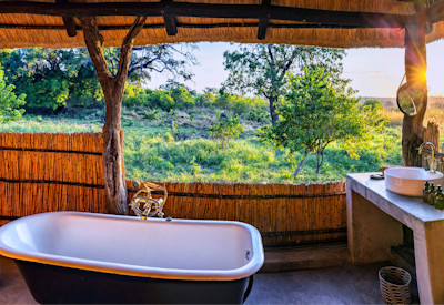 Bumbusi Wilderness Camp en-suite bath shower game drives walking Hwange Zimbabwe