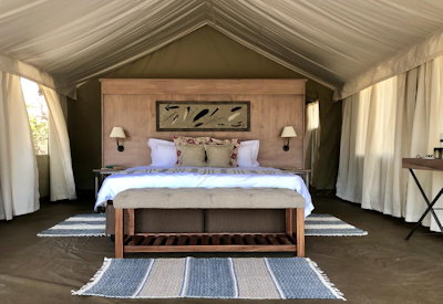 Ingwe Pan Camp large comfortable bedroom indoor outdoor showers Mana Pools Zimbabwe