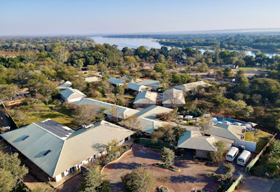 Insika Lodge new boutique safari hotel Craig Martin artwork teak furnishings Victoria Falls