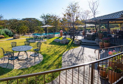 Insika Lodge central guest area alfresco dining deck firepit bar Victoria Falls Zimbabwe