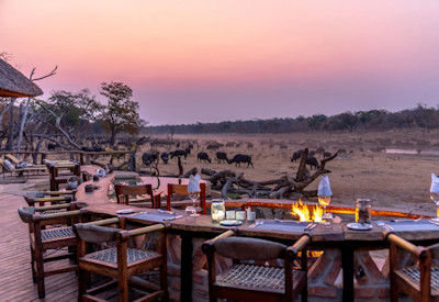 Khulu Bush Camp al fresco dining views surrounding wilderness Hwange Zimbabwe