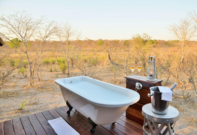 Khulu Bush Camp walking safaris honeymoon suite outdoor bath Hwange Zimbabwe
