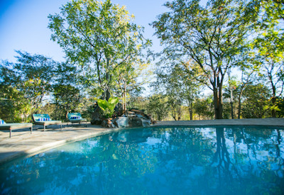 Masuwe Lodge original swimming pool shaded open hilltop Victoria Falls Zimbabwe