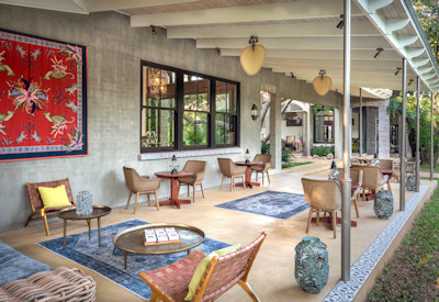 Mbano Manor Hotel outdoor dining eco-luxury experience Victoria Falls Zimbabwe