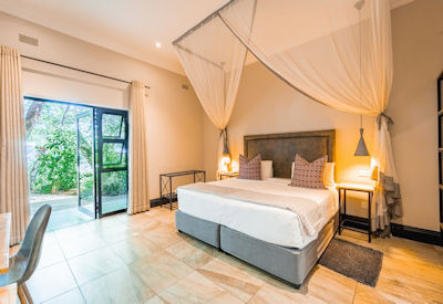 Nkosi Guest Lodge spacious superior rooms air conditioning private terrace Zimbabwe