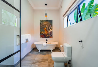 Nkosi Guest Lodge large en-suite bathroom spacious shower Victoria Falls Zimbabwe