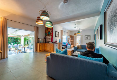 PheZulu Guest Lodge communal lounge area comfortable furnishings Victoria Falls Zimbabwe