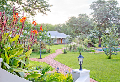 Pioneers Victoria Falls beautifully manicured lawns lush gardens Zimbabwe