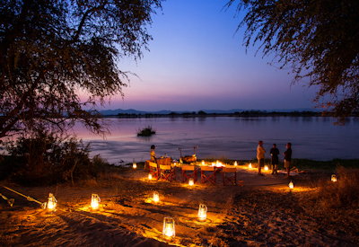 Sapi Explorers Camp outdoor dining Zambezi River banks Sapi Concession Zimbabwe