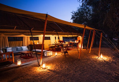 Sapi Explorers Camp tented lounge firepit Zambezi views Great Plains Conservation Zimbabwe
