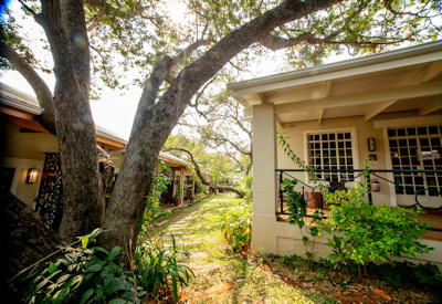 Shongwe Lookout manicured gardens lawns swimming pool Victoria Falls Zimbabwe