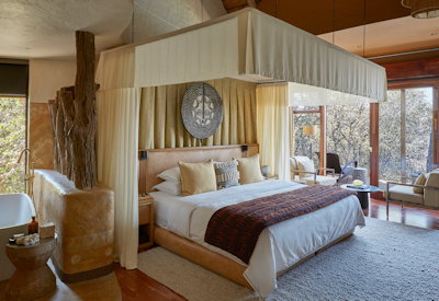 Singita Malilangwe House luxury queen suite private deck Malilangwe Wildlife Reserve Zimbabwe
