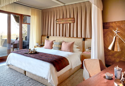 Singita Malilangwe House luxurious bedroom Malilangwe Dam views Zimbabwe exclusive-use