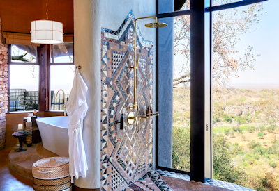 Singita Malilangwe House en-suite shower Malilangwe Wildlife Reserve views Zimbabwe