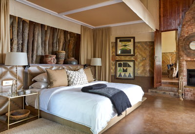 Singita Pamushana Lodge large luxury suite fireplace private plunge pool Zimbabwe