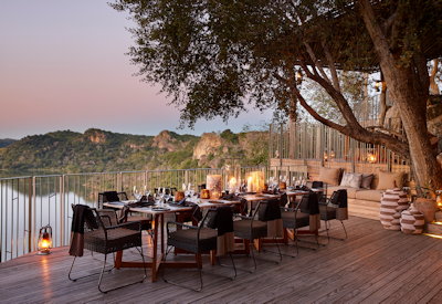 Singita Pamushana Lodge clifftop firepit sunset Malilangwe Wildlife Reserve Zimbabwe