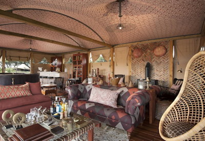 Somalisa Camp open-fronted lounge bar area waterhole views Hwange Zimbabwe