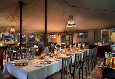 Somalisa Expeditions Camp tented indoor outdoor dining area Hwange National Park Zimbabwe