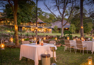Stanley Livingstone Boutique Hotel outdoor garden dining 1871 restaurant Victoria Falls