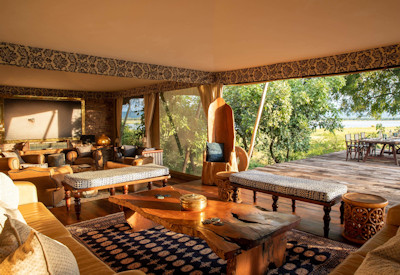 Tembo Plains Camp private suite indoor lounge air conditioning bar fridge Zimbabwe