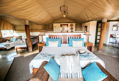 The Hide Hwange luxury tented safari suite indoor outdoor shower freestanding bath Zimbabwe