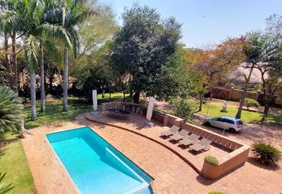 Shongwe Lookout manicured gardens lawns swimming pool Victoria Falls Zimbabwe