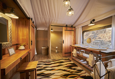 The Wallow Lodge en-suite bathroom indoor outdoor shower tented suite Zimbabwe