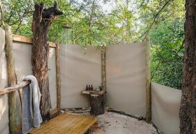 Tsowa Safari Island al fresco outdoor shower en-suite tented suite Zimbabwe