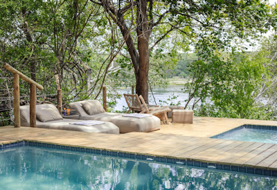Tsowa Safari Island two interconnected swimming pools Zambezi River island Zimbabwe