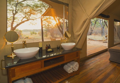 Verney's Camp en-suite bathroom flush toilet double vanity hot shower Zimbabwe