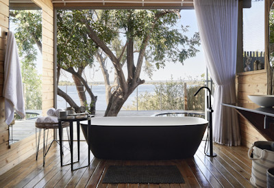 Victoria Falls River Lodge private plunge pool freestanding bath suite Zimbabwe