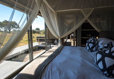 Linkwasha Camp 9 elegant tented suites large canvas windows bush sounds Hwange Zimbabwe
