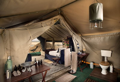 Zambezi Expeditions Camp en-suite hot water bucket shower Mana Pools Zimbabwe